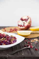 salad of red cabbage, pomegranate, apple and walnuts