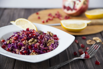 salad of red cabbage, pomegranate, apple and walnuts