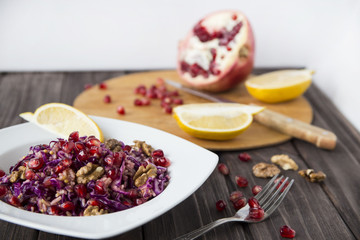 salad of red cabbage, pomegranate, apple and walnuts