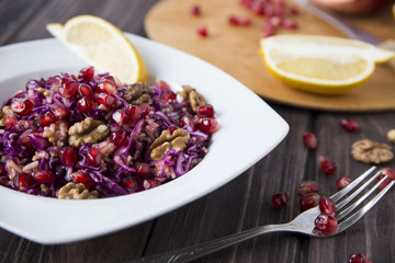 salad of red cabbage, pomegranate, apple and walnuts