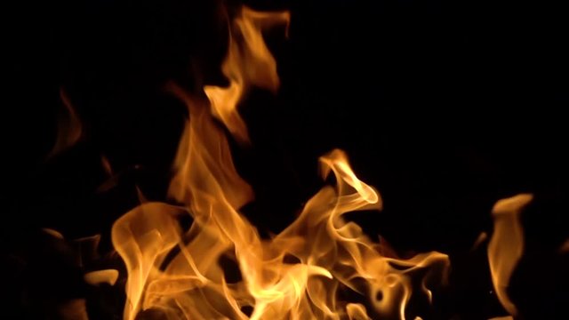 Flames of fire on black background in slow motion