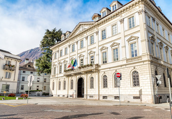 Fototapeta na wymiar View of palace hosting the Town hall. Historic buildings in Domodossola, Verbano Cusio Ossola, Piedmont, Italy