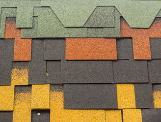 multi-colored bitumen shingles a sample of the product advertising