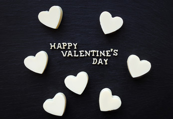 candy white chocolate in a heart - inscription Happy Valentine