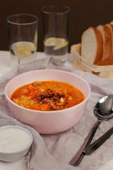 Lentil soup with white bread and cream