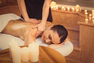 Obraz na płótnie Canvas Professional beautician massaging female back