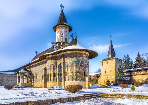 Sucevita orthodox painted church monastery in winter season, Suceava town, Moldavia, Bucovina, Romania
