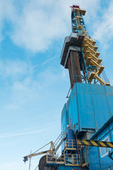 Fototapeta premium In the northern oil and gas field. Drilling rig. Before her lay the drill pipes.