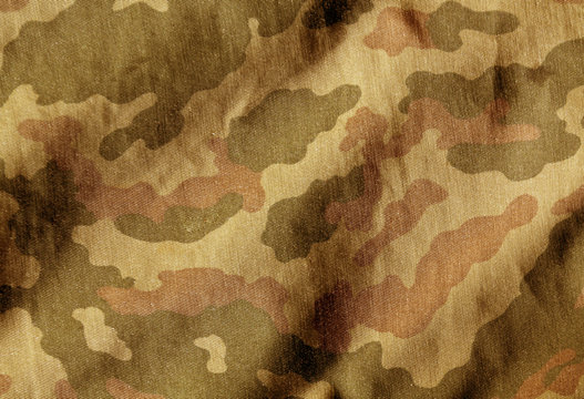 Camouflage color cloth surface.