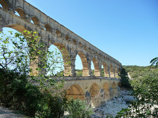 The Pont du Gard, France: an ancient aqueduct with many arch.