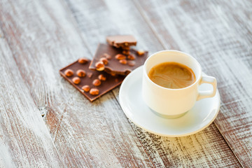 chocolate with coffee on a wooden white table