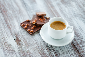 chocolate with coffee on a wooden white table