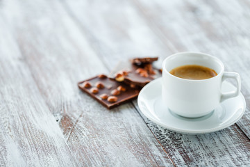 chocolate with coffee on a wooden white table