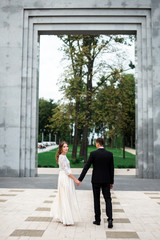 happy bride and groom at a park on their wedding day