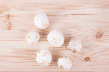 Fresh mushrooms on wood table