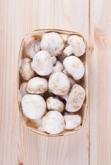 Fresh mushrooms on wood table