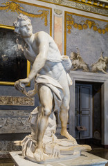 Marble sculpture David by Gian Lorenzo Bernini in Galleria Borghese - obrazy, fototapety, plakaty