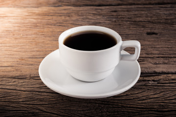 Cup of coffee on a wooden table