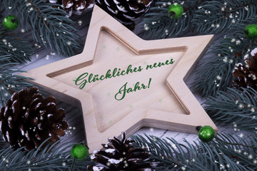 Holiday greeting card with text Gluckliches neues Jahr, German