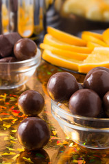 Round candy  from chocolate close-up on a colorful background