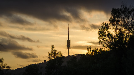 Yellow sunset light and tower in Barcelona, Spain