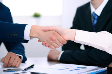 Business people shaking hands finishing up a meeting