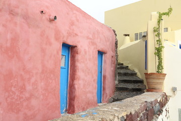 Santorini Greece - red house with blue doors