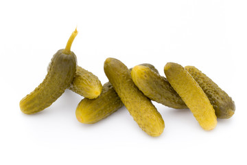 Marinated pickled cucumbers isolated on the white.
