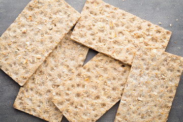 Stack of wholegrain crispy bread with sunflower, chia and sesame