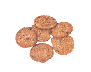 Crispy crunchy oatmeal raisin cookies isolated on white background