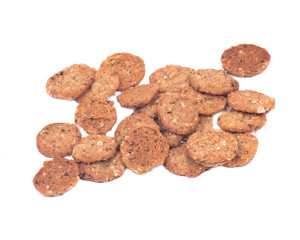 Crispy crunchy oatmeal raisin cookies isolated on white background