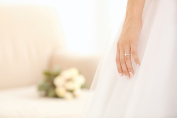 Obraz na płótnie Canvas Bride's hand with ring