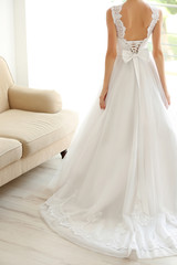 Fototapeta na wymiar Bride in a beautiful wedding dress