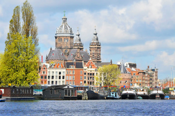 Fototapeta premium View of Amsterdam with houses built on canals 