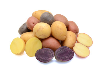 Mixed varieties of potatoes: red potatoes, yellow potatoes and purple potatoes