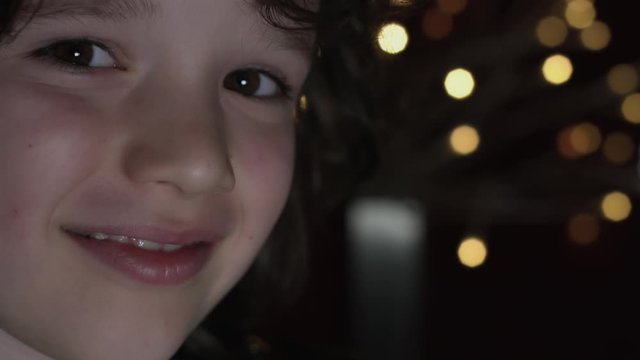 4k Shot of a Cute Child in Studio  Smiling (close-up, LED lights background)