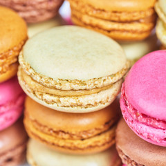 A pile of colorful french macaroons