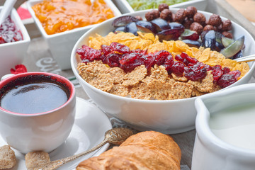 French breakfast on a wooden tray