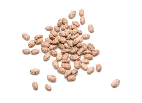 healthy brown pinto beans on white background