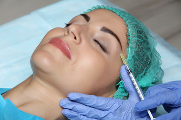 Fototapeta na wymiar Procedure of facial injection closeup