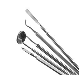 Dentist medical tools on white background