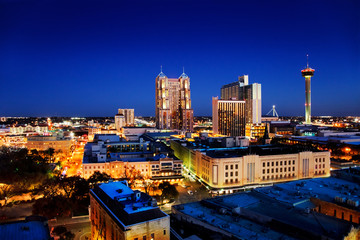 San Antonio downtown just after sunset showing skyline around Tower of the Americas & city lights - obrazy, fototapety, plakaty