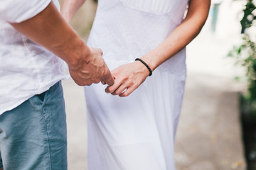 lovely couple holding hands together