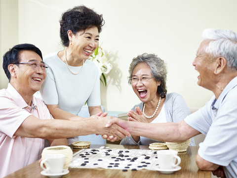 Senior Asian People Playing Weiqi