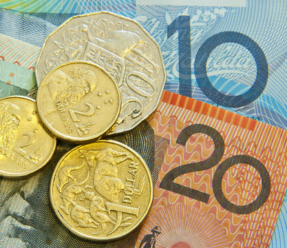 Close up Austrtalian bank notes coins copyspace.