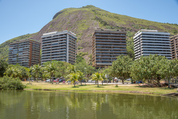 Rodrigo de Freitas Lagoon and four elite residential house against the background of the hill at Lagoa district, Rio de Janeiro, Brazil
