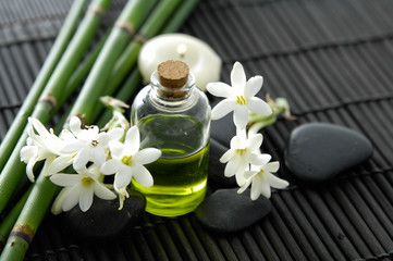 Spa setting with flower, grove, oil ,stones,candle