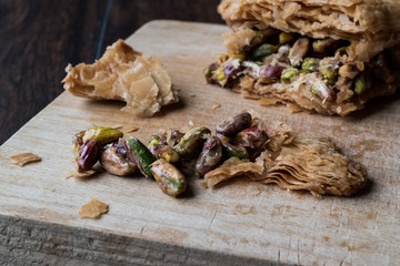 Bitten Dessert Baklava with Pistachio.