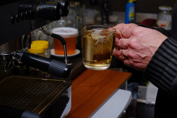 the bartender prepares the tea
