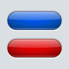 Blue and red oval buttons. On gray plastic background